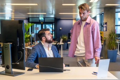 Two men with a computer