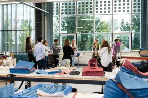 Group of people in a clothing NGO