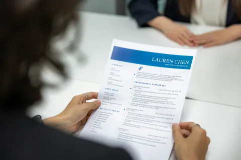 Someone preparing their CV
