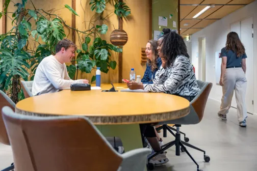 Young employees have a meeting in an office