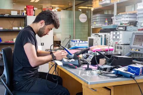 Student working on high tech project