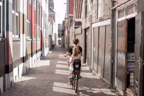 Riding a bike in streets of Delft
