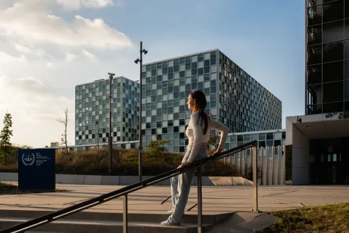 Young girl in front of the International Criminal Court