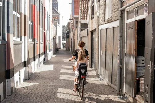 Riding a bike in streets of Delft