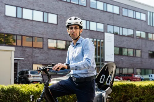 Man cycling work